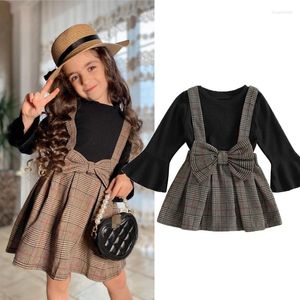 Set di abbigliamento FOCUSNORM 1-7Y Moda Autunno Bambini Ragazze Vestiti a coste Manica lunga svasata Pullover Top Plaid Stampato Arco Bretelle Gonne