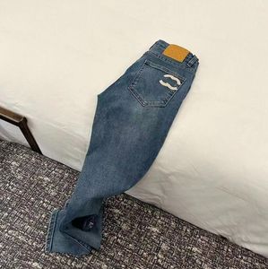 メンズ女性パンツのデザイナーブランドジーンズサマーホール新しいスタイル刺繍自己栽培と小さな足