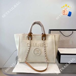 Axelväskor designer sommarstrand handväska c bokstav axel blixt kontor hög kvalitet klassisk dukväska med knapp retro kvinnors bagbag