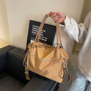 Bolsas de ombro Bolsa de grande capacidade para mulheres em 2023 nova bolsa casual Oxford giratória nicho moda simples e moderna bolsa crossbodyH2422