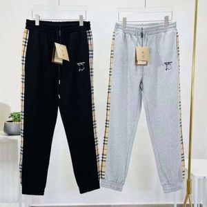 Designer Burbury Hoodie Autumn and Winter New Plaid Patchwork Men's and Women's Casual Pure Cotton Sanitary Pants små och löst passande svart