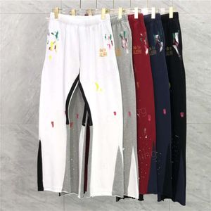 22SS Autumn Winter Europe Splash Ink Patchwork Spodnie Złote druk spodnie Bell-Bottoms swobodne sznurki dresowe mężczyźni kobiety jogger szczupły dopasowanie