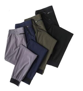 LUIU Pantaloni lunghi da jogging da uomo Pantaloni sportivi da yoga Asciugatura rapida con coulisse Tasche da palestra Pantaloni sportivi Pantaloni Casual Elastico in vita Fitness Designer di lusso Pant hh