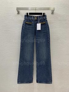 Designerskie kobiety dżinsowe spodnie damskie dżinsowe spodnie Modne spodnie szerokich nóg dekoracja łańcucha metalowego łańcucha luźne dopasowanie spustów nogi wypoczynek Wszechstronny dżinsy dla kobiety