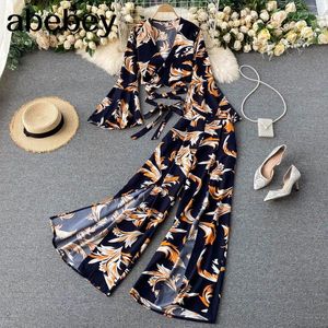 Kvinnors spårningsdräkter Bohemian Vacation Beach Tvåverk Set Women Sexig V-ringning Bandage Korta toppar Hög midja Split Wide Leg Pant Suit Spring