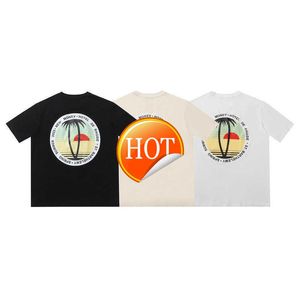 Marca de moda Sunset Coconut Tree Letter Printing Camiseta curta para homens e mulheres Rua solta meia manga