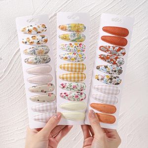 ヘアアクセサリー10pcs/lot ins babhighers hairpins 5.5cmフラワープリントコットンボウスナップクリップセットファブリック格子縞のボビーヘアグリップスキッズヘッドウェア