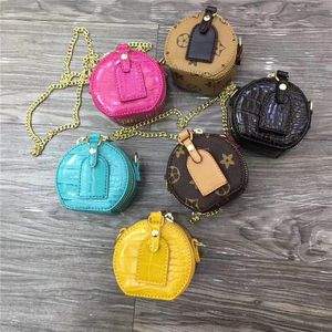 Barndesigner Purses Nyaste koreanska barn Chain Chain Cross-Body Bags Girls Princess Mini Candies Snack Bags Coin Purs Purs Tonåring Shoulder Bags 6Colors tillgängliga