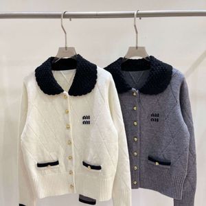 2024SS MM Kobiet Dzianin Tops Designer Sweter wełniany wełna Lapel Knigan Knitwear Loose Outdoor Short Swatters Kurtka