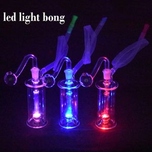 Partihandel glöd i den mörka glasoljebrännaren bongs led lätt dab rigg aska catcher bong dab olje riggar med 10 mm glas oljebrännare rör och slang billigast