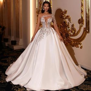 Lyxig dubai puffy bröllopsklänning en axel kristaller pärlstav illusion satin brud klänning vestidos de novia robe de mariage