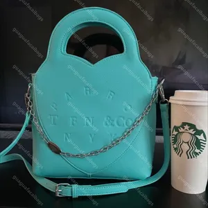 10a lüks gerçek inek derisi torbası kova çantası kadın bir omuz crossbody çanta tasarımcısı çanta çanta litchi tahıl zinciri dekorasyon tote lüks alışveriş deri çanta