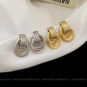 Orecchini geometrici annodati intrecciati con ago in argento moda per donna, orecchini semplici in metallo peplo, orecchini da donna di design di lusso