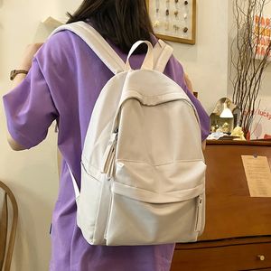 シンプルソリッドカラーバックパック女性ティーンエイジャーの女の子用の防水ナイロンスクールバッグ