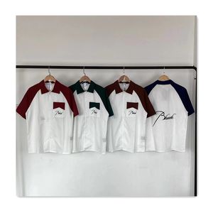 Summer Men skjortor Designer Skjortor LAPEL Color Blocking Kort ärmskjortor Letter Print Business Casual Löst montering Mens Polo Shirt mångsidig modemän