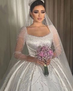 Abito da sposa macchiato di perle di lusso maniche lunghe colletto quadrato lunghezza del pavimento pizzo abiti da sposa africani su misura Vestido de novia