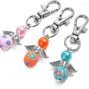 Keychains 10Pcs Colorful Polymer Clay Key Chain Bag Punk Guardian Angel Wings Ring Charm Pearl Car Keychain Handbag Aesthetic Gift