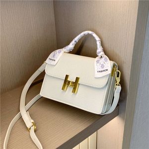 High End liten fyrkant för kvinnors sommar ny nisch handväska en axel ins crossbody väska 2024 78% rabatt i butik grossist