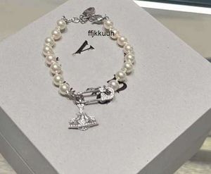 Designer de moda Pearl Saturn pulseiras designer planeta escavado diamante completo Pin Pearl pulseira para homens mulheres jóias de luxo orecchini bijou2256