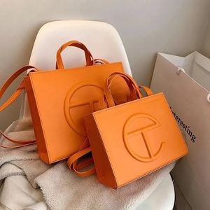 Förvaringspåsar mode axel crossbody candy colors bags kvinnor / kvinnliga telefon plånböcker handväskor övre handen stor kapacitet på bagsstorage dhl