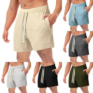 Erkek şort yaz erkekler rahat erkek gevşek spor plajı cepli spor salonu eşofmanları 2024 çok kısa pantolon adam giyim