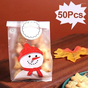 Decorações de Natal 50pcs Sacos de doces de biscoitos de boneco de neve Sacos de embalagem de presente de plástico de desenho animado Santa Decoração de árvore de Natal 2024 Festa de ano