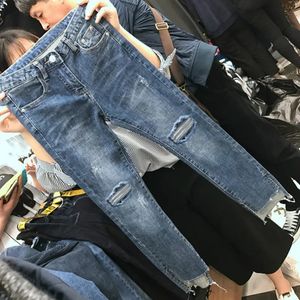 Sıska yırtık kot kadınlar bahar yaz sonbahar satan kadın moda gündelik kızlar sevimli denim pantolon kadın toptan 240119