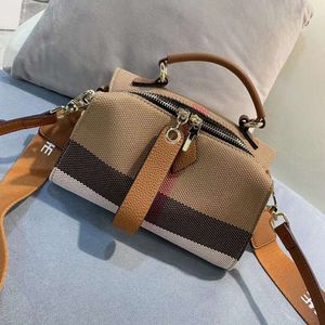 Novo xadrez high end estilo lona couro genuíno crossbody handheld travesseiro feminino saco na moda 2024 78% de desconto na loja atacado