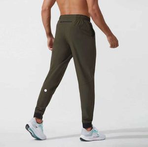 Lululemen adam lulu kısa pantolon yoga kıyafeti jogger spor hızlı kuru çizim sporu cepleri eşofmanlar pantolonlar erkek gündelik elastik bel fitness ventilate
