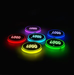 2st LED CAR Cup Holder Logo Light för Nissan Ford Mercedes Jeep USB Charging Minous Coaster Accessories7161936