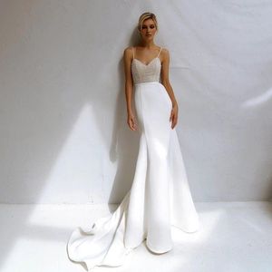 Ny Bohemian Mermaid Wed Dress Crystal Bridal Gowns Summer Beach Bridal Dress Robe de Mariee Sexig Spaghetti Strap Pearls Pärled Corset Beach Mermaid Wedding Dresses