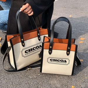 Canvas Tote Damen Neue trendige Handtasche bedruckter Buchstabe One Shoulder Umhängetasche 2024 78 % Rabatt im Großhandel