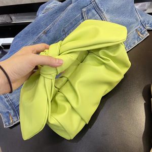 Street photo designer's bow handbag 2023 spring/summer new satin handbag pleated cloud bag single shoulder diagonal cross handbag versatile leather light yellow