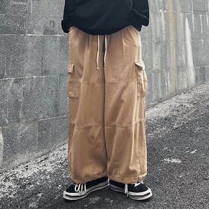 Pantaloni da uomo Pantaloni cargo larghi maschili Pantaloni sportivi multitasche solidi Tether Gamba larga lunga per uomo Abbigliamento da lavoro largo Ropa Hombre