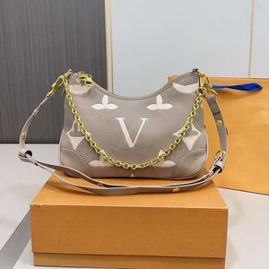 Luxury Tote Bag designer axelväskor präglade bokstäver ko horn bun crossbody väskor riktiga läder crossbody lyx mode totes väskor högkvalitativ kedja väska