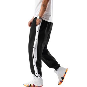 Spring Men Hip Hop Presspants Button Sport Tracksuit Paski Butode Spodnie do Joggera szerokie nogi do joggingu Sportswear Streetwear 240124