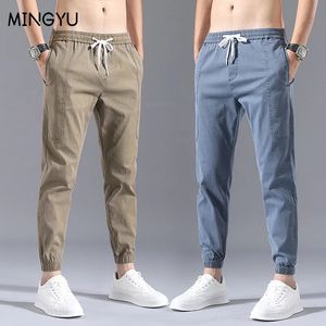 Primavera verão streetwear hip hop calças de carga calças de carga masculina elástica harun tornozelo comprimento calça corredores cáqui imitar jeans masculino 240124