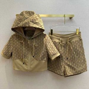 Kvinnors jackor designer sommar ny brev jacquard set kort dragkedja huva kortärmad hoodie topp shorts tvådelar kvinnlig mode g brev tryckt jacquard