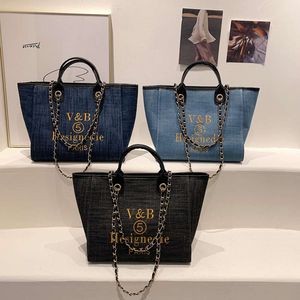 Kadınlar 2023 yeni tek omuz büyük kapasiteli el zinciri Instagram Crossbody Bag 75% Fabrika Doğrudan Satış