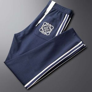 High End Embroidered Blue Sports Pants for Men in Spring and Summer. High End Straight Fit with Small Feet and Contrasting Colors for Casual Fashion Pants