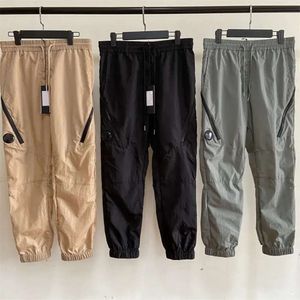 Mens Pant Cargo Pocket Lens Nylonowe spodnie do spustu spodnie na zewnątrz wodoodporne dresy luźne Man Szybkie suche spodnie 660