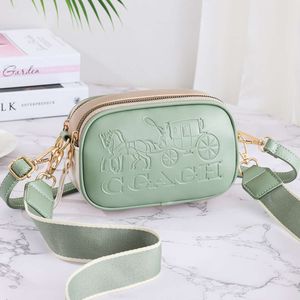 Câmera feminina em relevo moda coreana telefone fresco e doce alça dupla multi camadas bolsa crossbody de ombro único vendas diretas da fábrica