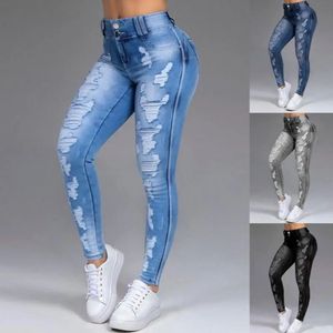 Рваные джинсовые брюки, эластичные женские джинсы больших размеров с пуговицами для повседневной носки 240119