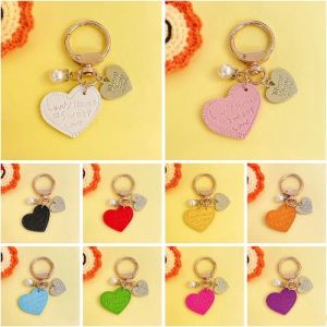 UPS Party Favor Engraved Heart Pendant Keychains Alloy Pearl Key Chain Creative PU Leather Backpack Pendants 0415