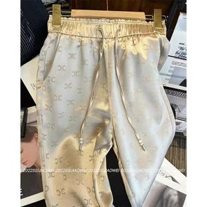 Pantaloni da donna firmati pantaloni a vita alta elastici con fusciacca da donna con coulisse logo stampa pantaloni sportivi in raso da donna Vita elastica a gamba larga Pantaloni casual da tutti i giorni