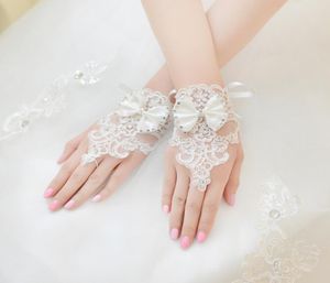 Högkvalitativ vit fingerlös brudhandskar Kort handledslängd Elegant Rhinestone Bridal Wedding Gloves Bride Glove 7637867