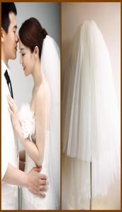 2019 nova chegada curto camadas véus de noiva tule fundo natural branco vestido de casamento accessries véu fofo com comb5352522