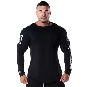 Mężczyźni chuda koszula z długim rękawem Sprężyna swobodna moda Tshirt męska siłownia fitness czarny koszulka Szybka sucha kulturystyka odzież 240124