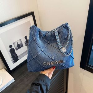 Ny högkapacitet denim tygväska för kvinnors år trend mode nisch singel axel crossbody chain handbag fabrik direktförsäljning