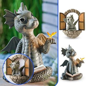 Simpatico piccolo drago dinosauro meditazione libro di lettura scultura figura giardino decorazione della casa ornamento in resina decorazione per esterni 240122